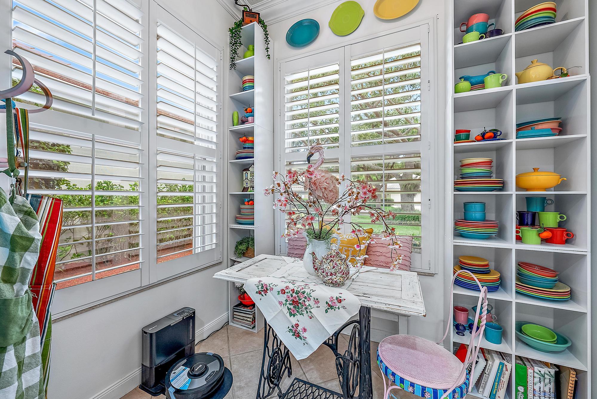 115 South Hampton Drive Jupiter, FL 33458 - Photo 15 of 27 a outdoor living space with furniture and a potted plant