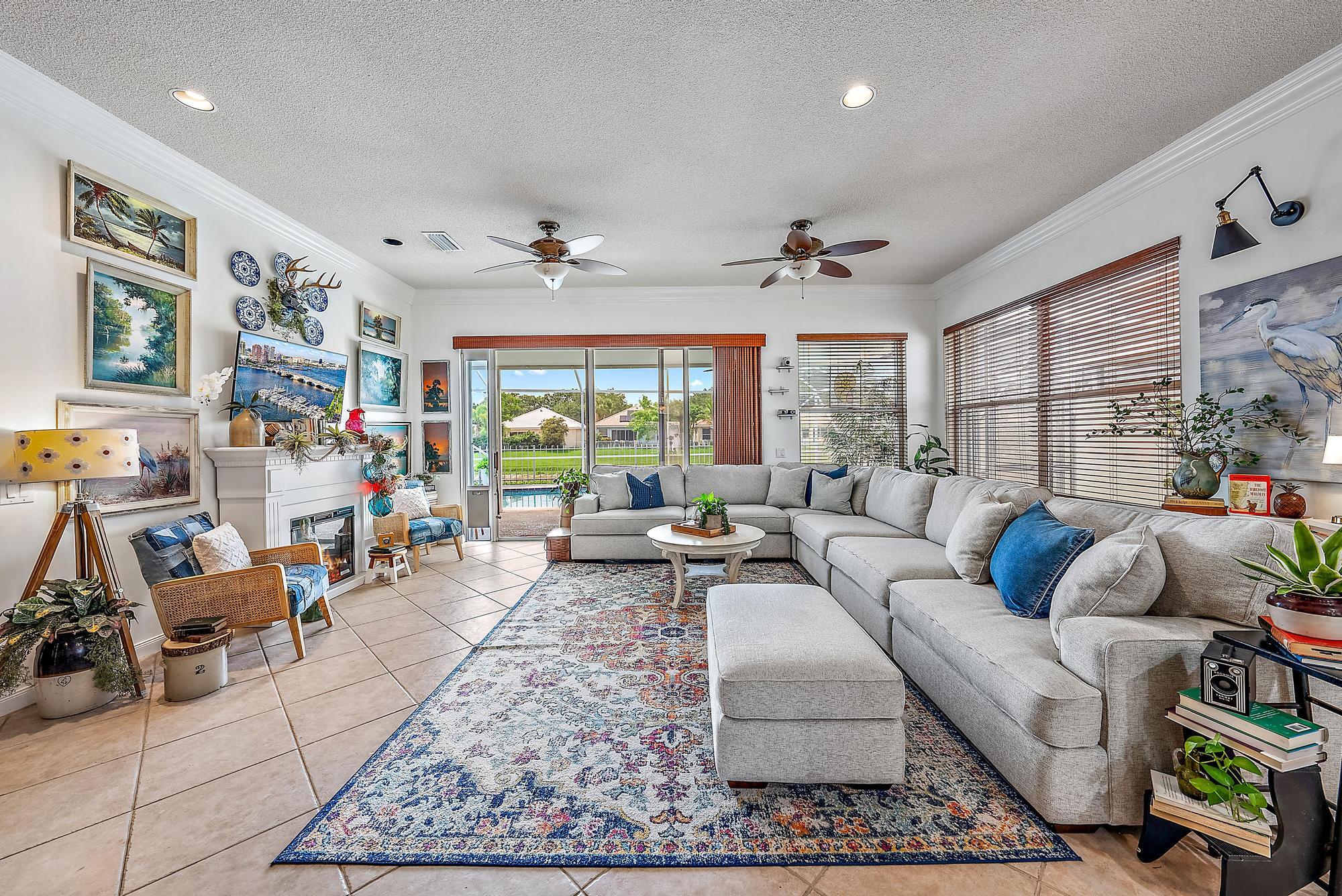 115 South Hampton Drive Jupiter, FL 33458 - Photo 18 of 27 a living room with furniture and a large window