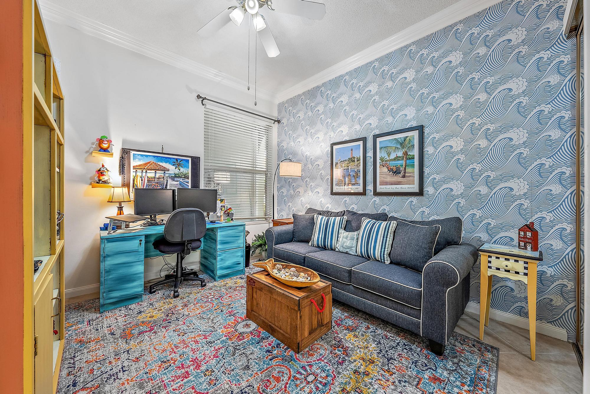 115 South Hampton Drive Jupiter, FL 33458 - Photo 26 of 27 a living room with furniture and a piano