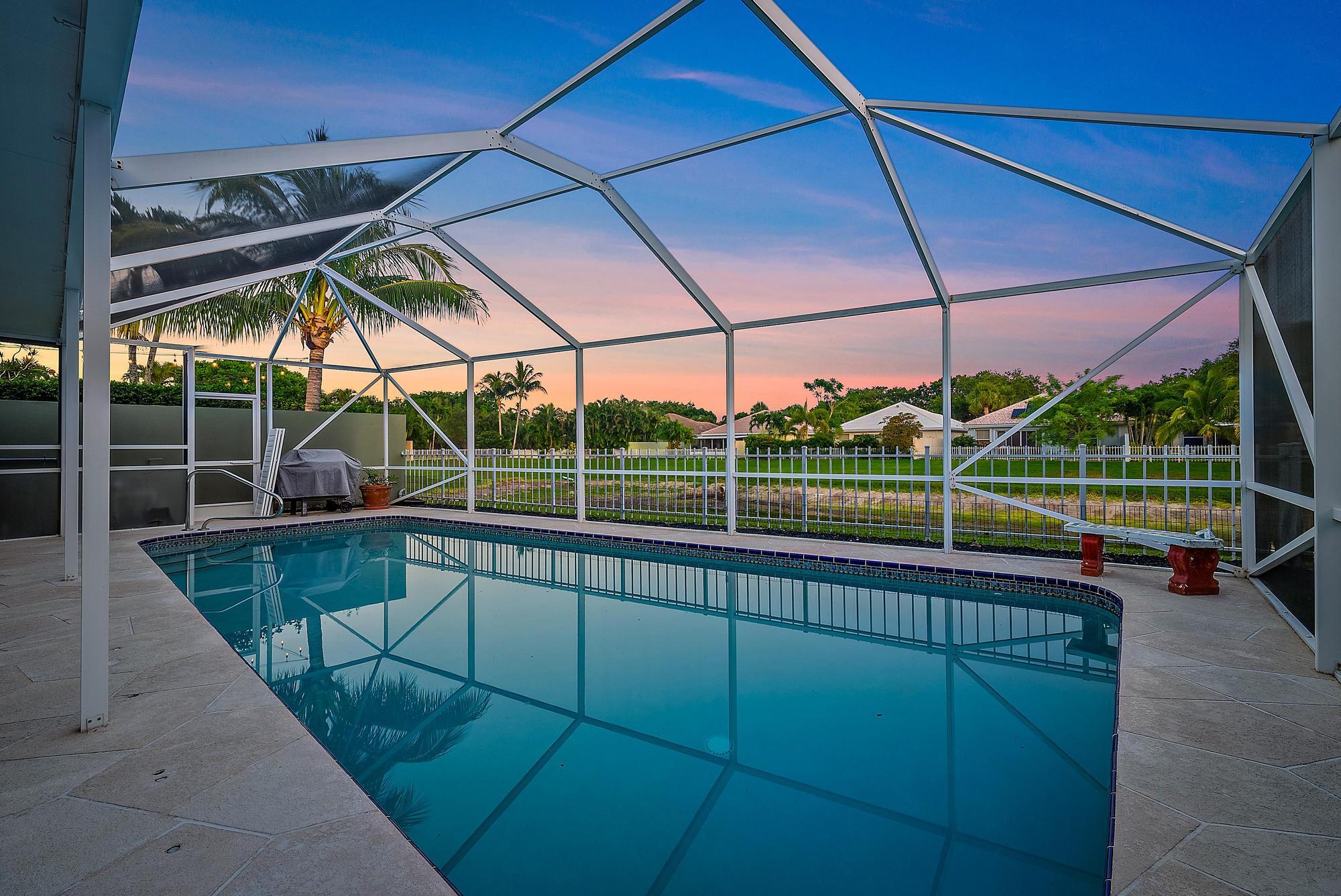 115 South Hampton Drive Jupiter, FL 33458 - Photo 5 of 27 a view of a tennis court