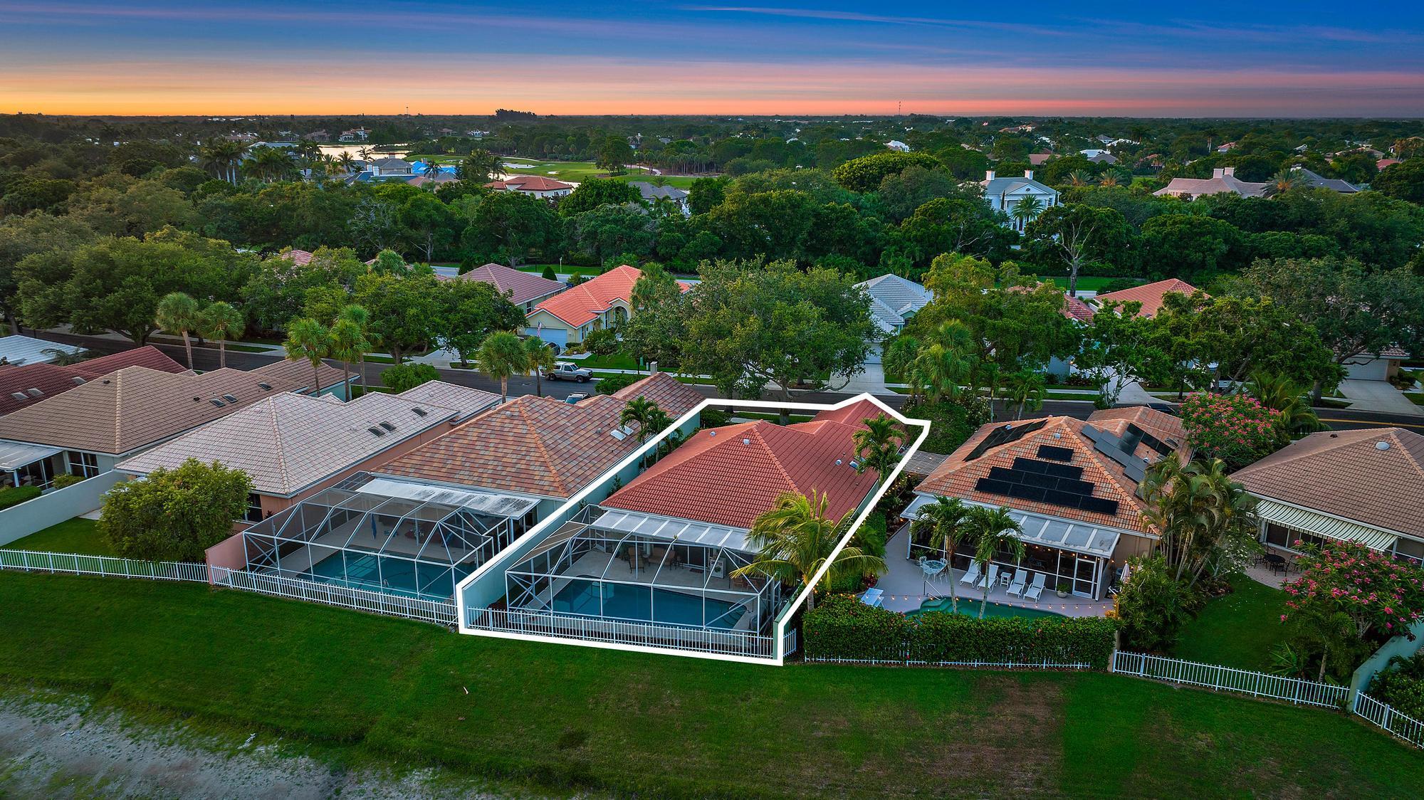 115 South Hampton Drive Jupiter, FL 33458 - Photo 8 of 27 a aerial view of a house with a garden