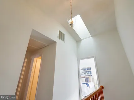 a view of a hallway with entryway