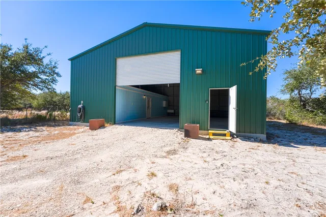 a view of a backyard of a house