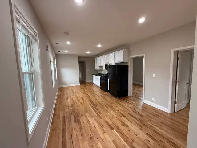 a view of livingroom with furniture and wooden floor