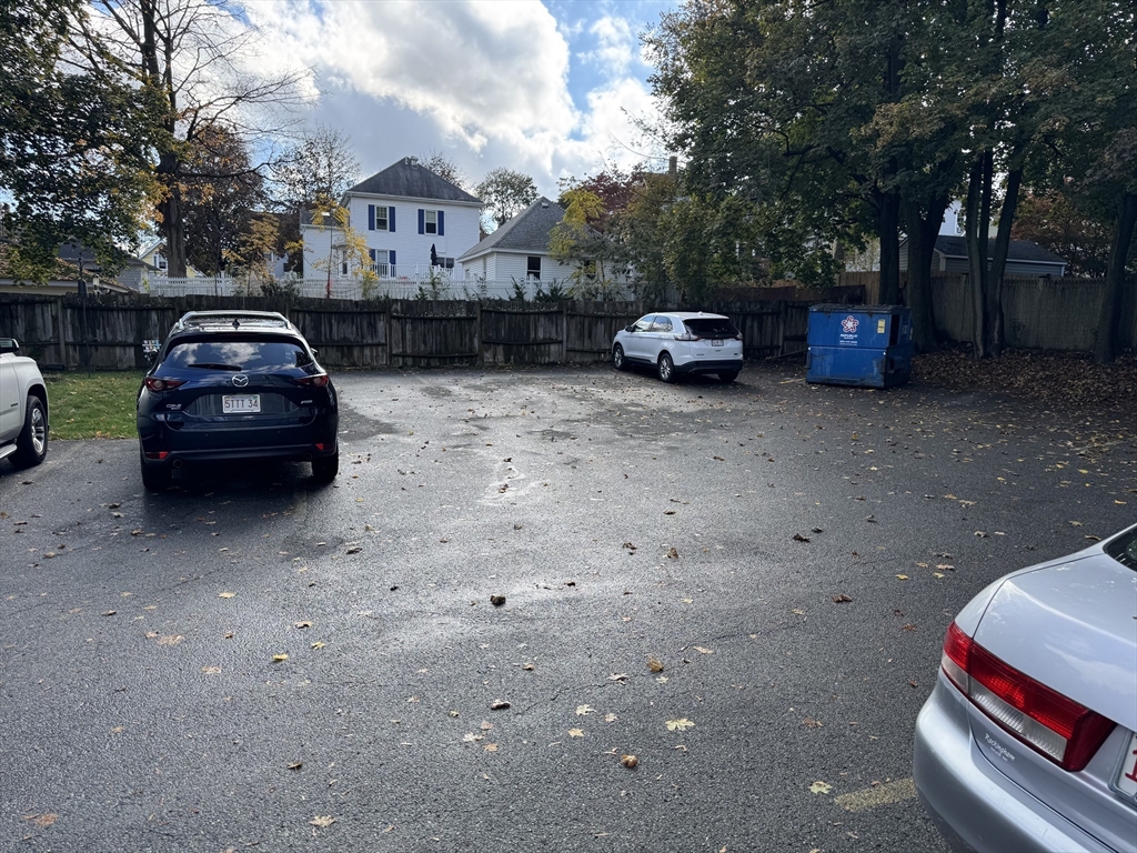 286 South Main Street, Unit 10 Haverhill, MA 01835 - Photo 11 of 11 a car parked in front of a house