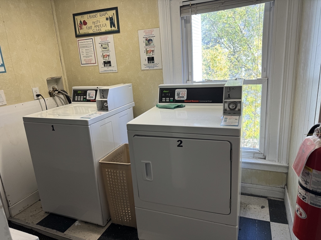 286 South Main Street, Unit 10 Haverhill, MA 01835 - Photo 9 of 11 a utility room with dryer and washer