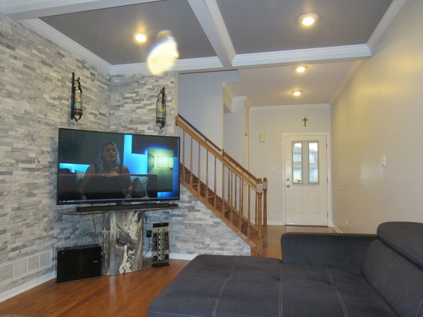 696 Western Lane Addison, IL 60101 - Photo 9 of 36 a view of a livingroom with furniture and a flat screen tv