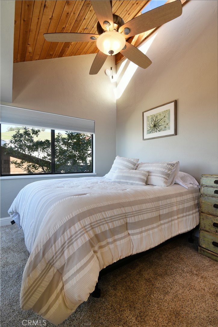 2640 Maple Morro Bay, CA 93442 - Photo 22 of 29 a bedroom with a bed and a window