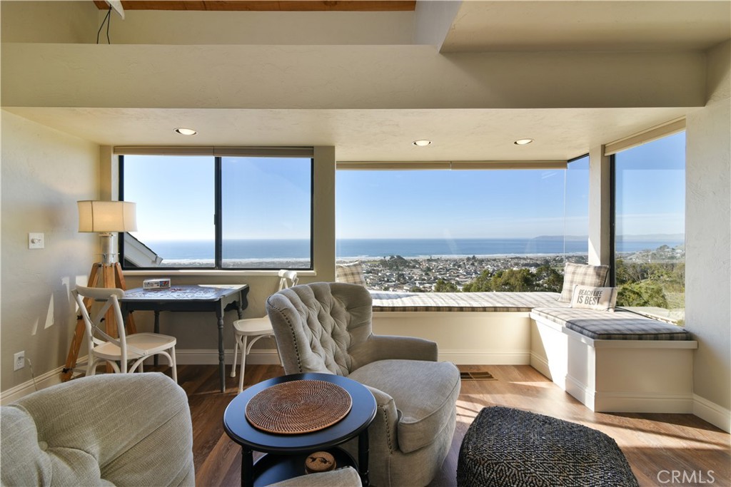 2640 Maple Morro Bay, CA 93442 - Photo 5 of 29 a living room with furniture a rug and a window