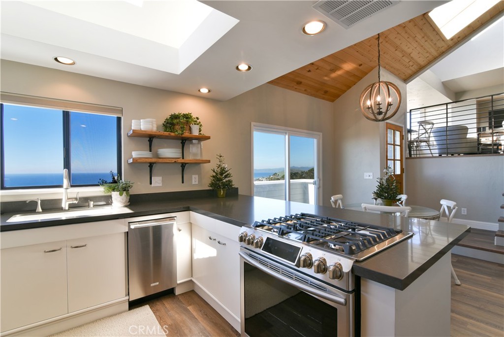 2640 Maple Morro Bay, CA 93442 - Photo 8 of 29 a kitchen with a stove and a sink