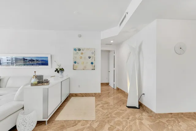 a view of kitchen with furniture and wooden floor