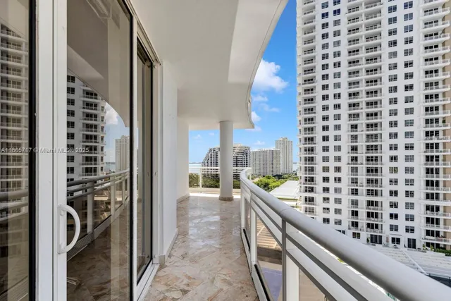 a kitchen with a refrigerator and a stove