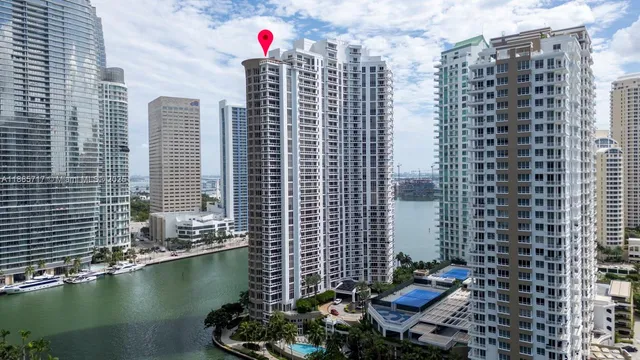 a front view of a building with lake view