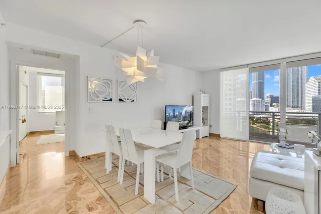 a view of a dining room with furniture