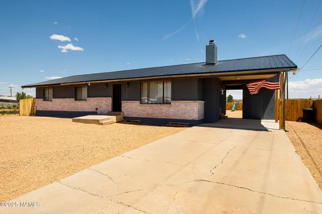 a front view of house with yard