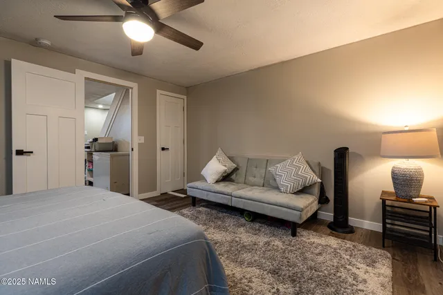 a kitchen with a refrigerator and a sink