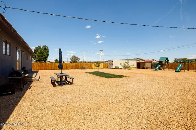 a view of a swimming pool with a lounge chairs