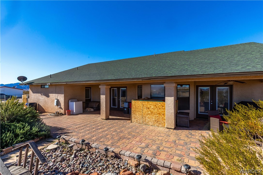 300 South Cibola Road Golden Valley, AZ 86413 - Photo 36 of 67 a view of a house with a yard