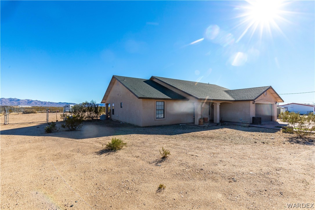 300 South Cibola Road Golden Valley, AZ 86413 - Photo 58 of 67 a view of a house in the snow yard