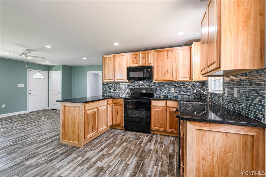 338 Prospect Road Prospect, VA 23960 - Photo 16 of 41 a kitchen with stainless steel appliances granite countertop a stove a sink and a refrigerator