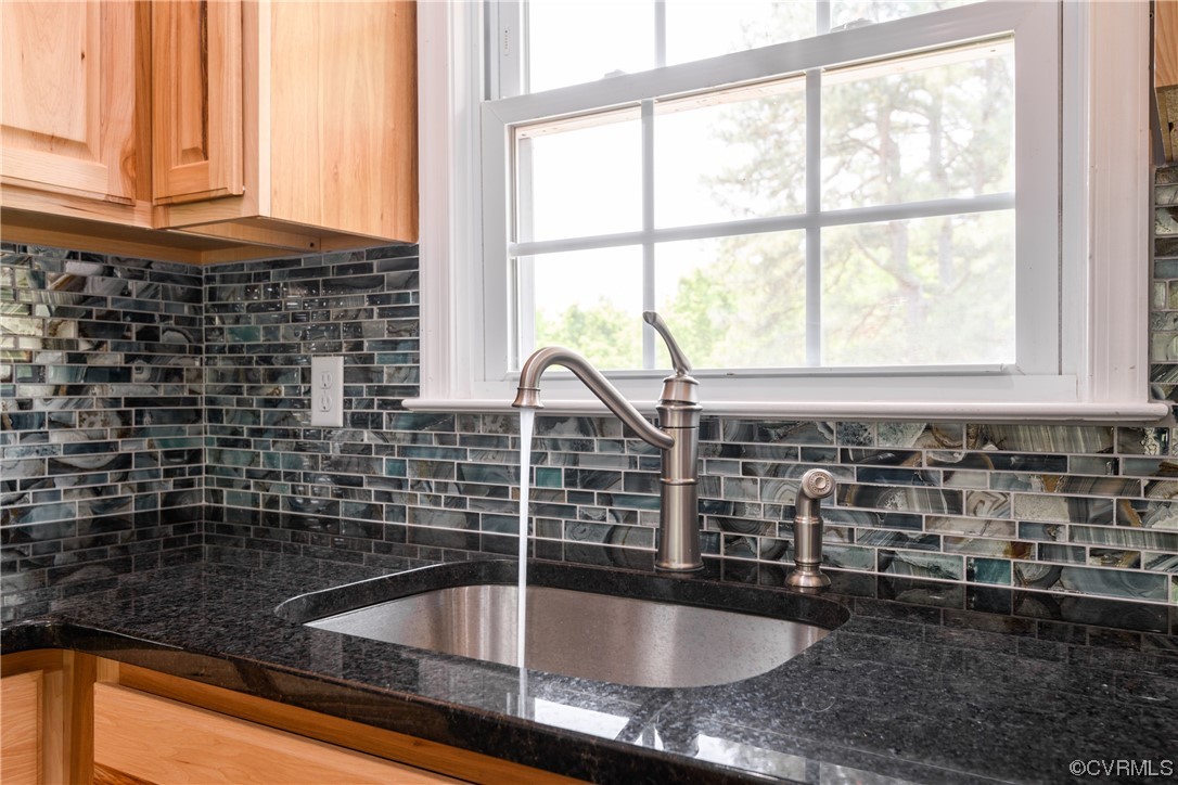 338 Prospect Road Prospect, VA 23960 - Photo 20 of 41 a bathroom with a granite countertop sink and a large window