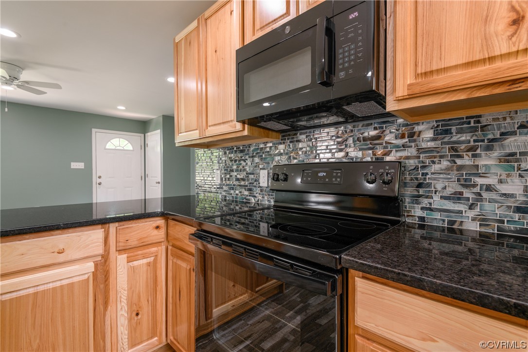 338 Prospect Road Prospect, VA 23960 - Photo 21 of 41 a kitchen with a stove microwave and cabinets