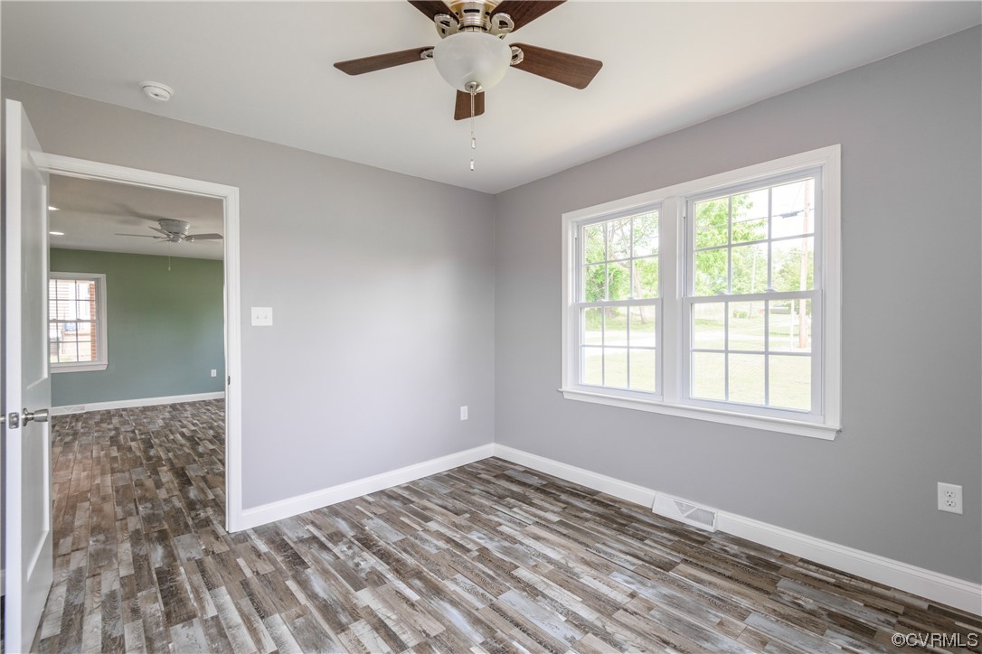 338 Prospect Road Prospect, VA 23960 - Photo 25 of 41 a view of empty room with wooden floor and fan