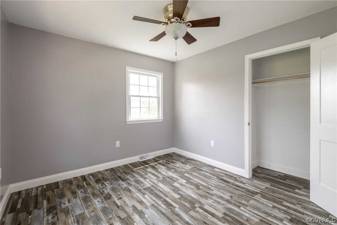 338 Prospect Road Prospect, VA 23960 - Photo 27 of 41 wooden floor in an empty room with a window