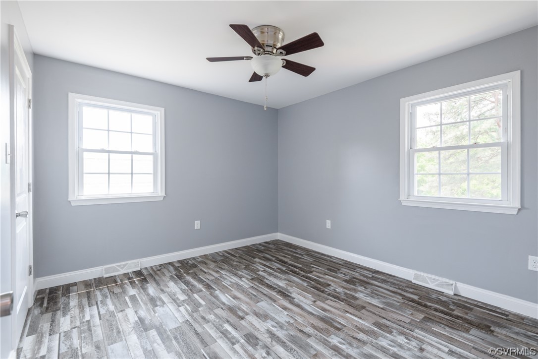 338 Prospect Road Prospect, VA 23960 - Photo 30 of 41 a view of empty room with wooden floor and fan