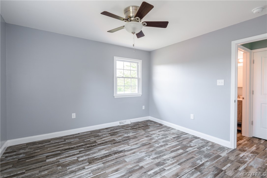 338 Prospect Road Prospect, VA 23960 - Photo 32 of 41 wooden floor in an empty room with a window