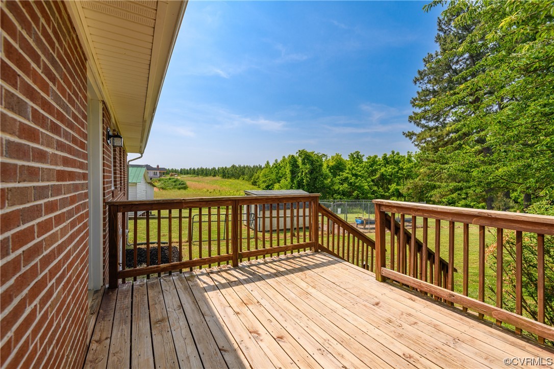 338 Prospect Road Prospect, VA 23960 - Photo 35 of 41 a view of balcony with wooden floor and fence