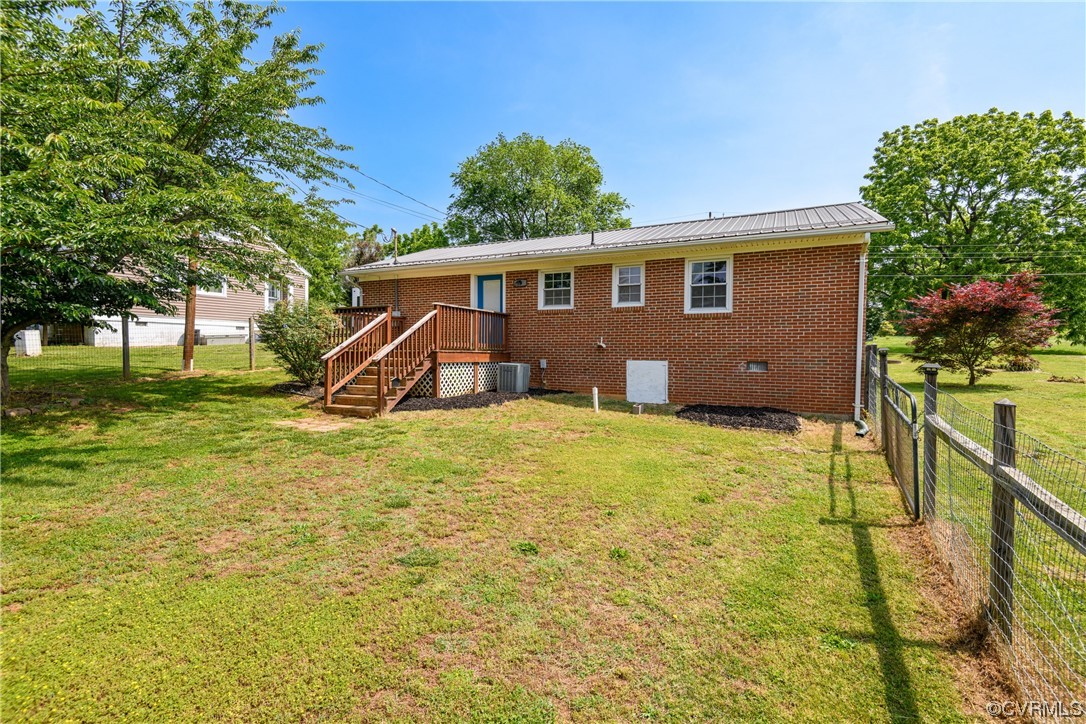 338 Prospect Road Prospect, VA 23960 - Photo 36 of 41 a front view of a house with a yard