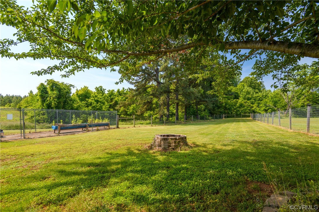 338 Prospect Road Prospect, VA 23960 - Photo 41 of 41 a view of a swimming pool with a yard and trees