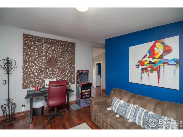 a open kitchen with cabinets and a table
