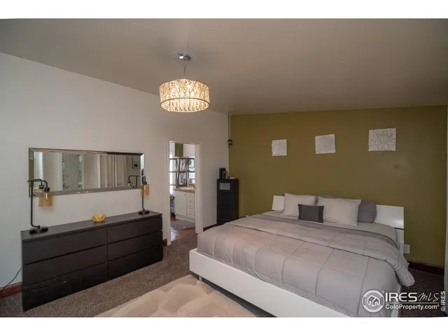 a bathroom with a sink double vanity granite and a mirror