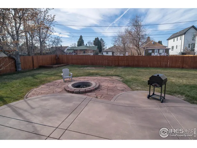 a view of a house with a yard porch and sitting area
