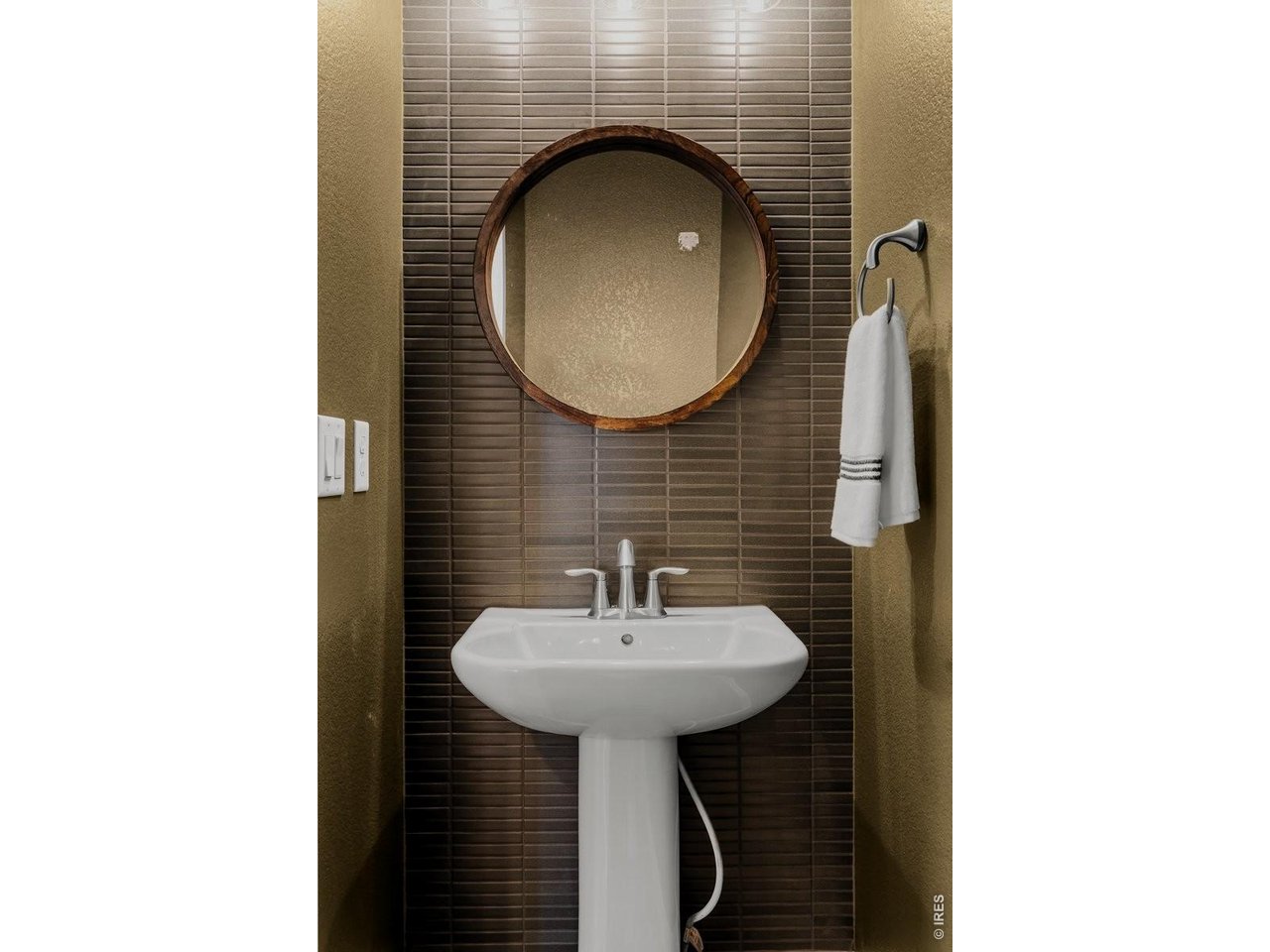 7027 Ruidoso Drive Windsor, CO 80550 - Photo 18 of 50 Powder Bathroom on Mail Level