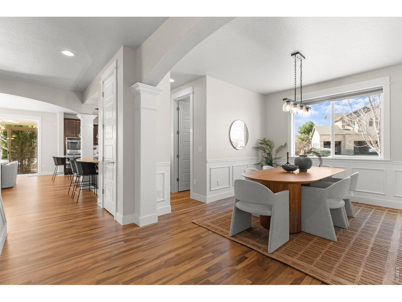 7027 Ruidoso Drive Windsor, CO 80550 - Photo 9 of 50 Gorgeous Newly Refinished Walnut Hardwood Floors