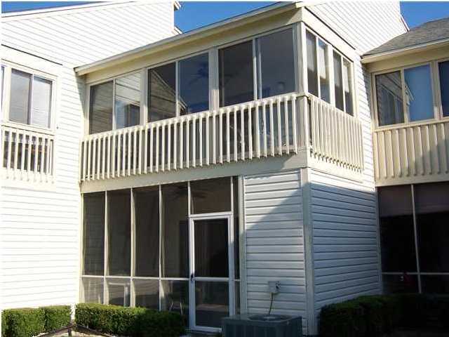 71 Misty Cove, Unit 207 Destin, FL 32550 - Photo 4 of 9 a view of a house with a window