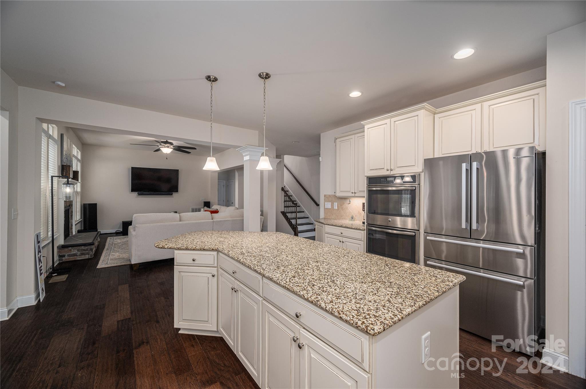 4050 Halyard Drive Denver, NC 28037 - Photo 17 of 48 a kitchen with a refrigerator sink and cabinets