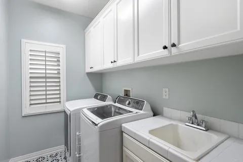 a view of a park with large trees