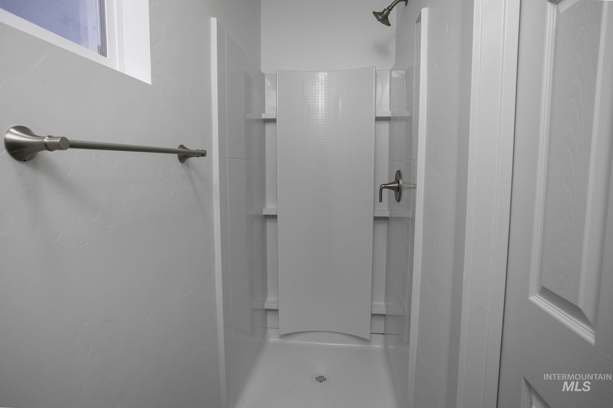 450 Greenleaf Street Boise, ID 83713 - Photo 8 of 17 Bathroom featuring a shower stall
