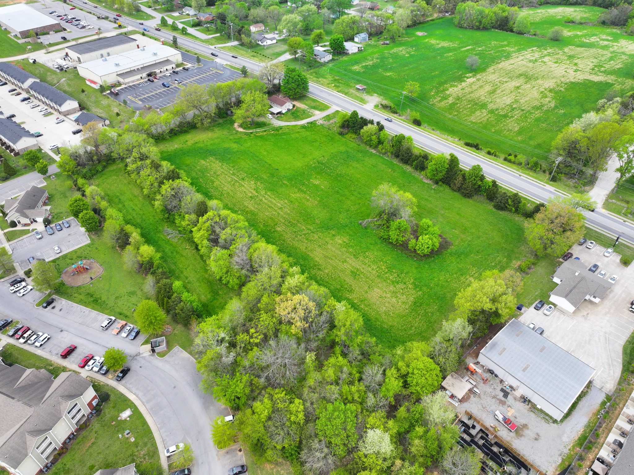 0 Needmore Road Clarksville, TN 37040 - Photo 18 of 20 an aerial view of residential houses with outdoor space and street view