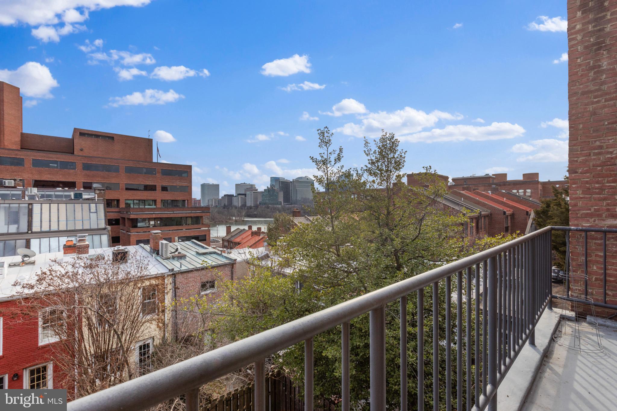3210 Grace Street Northwest, Unit 309 Washington, DC 20007 - Photo 1 of 43 a view of a balcony with city view