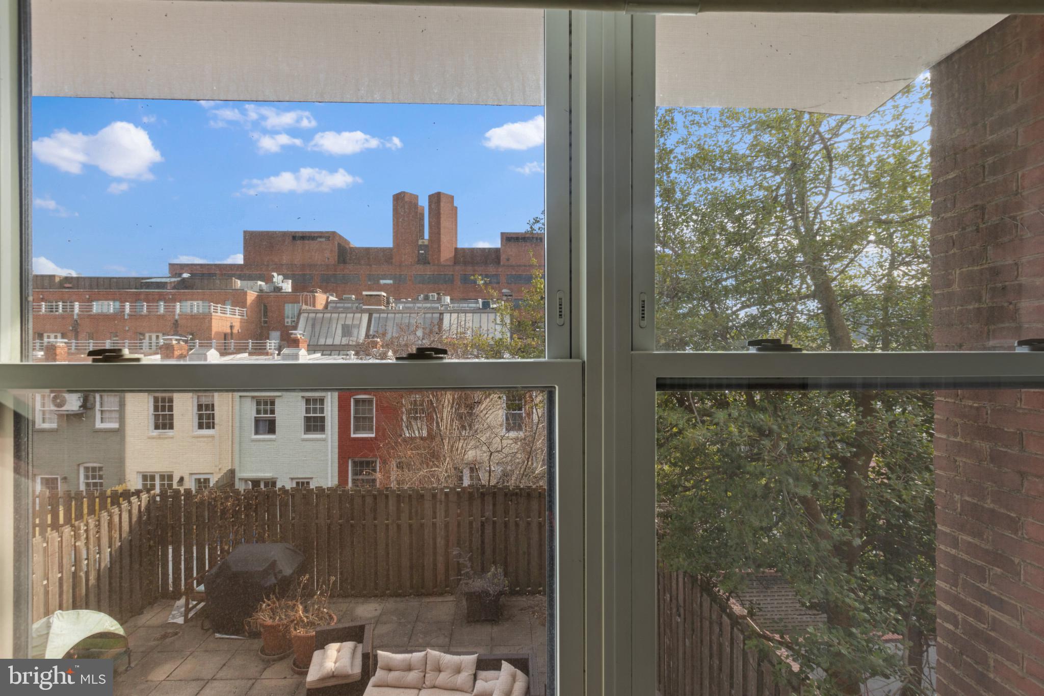 3210 Grace Street Northwest, Unit 309 Washington, DC 20007 - Photo 21 of 43 a view of a balcony with city view