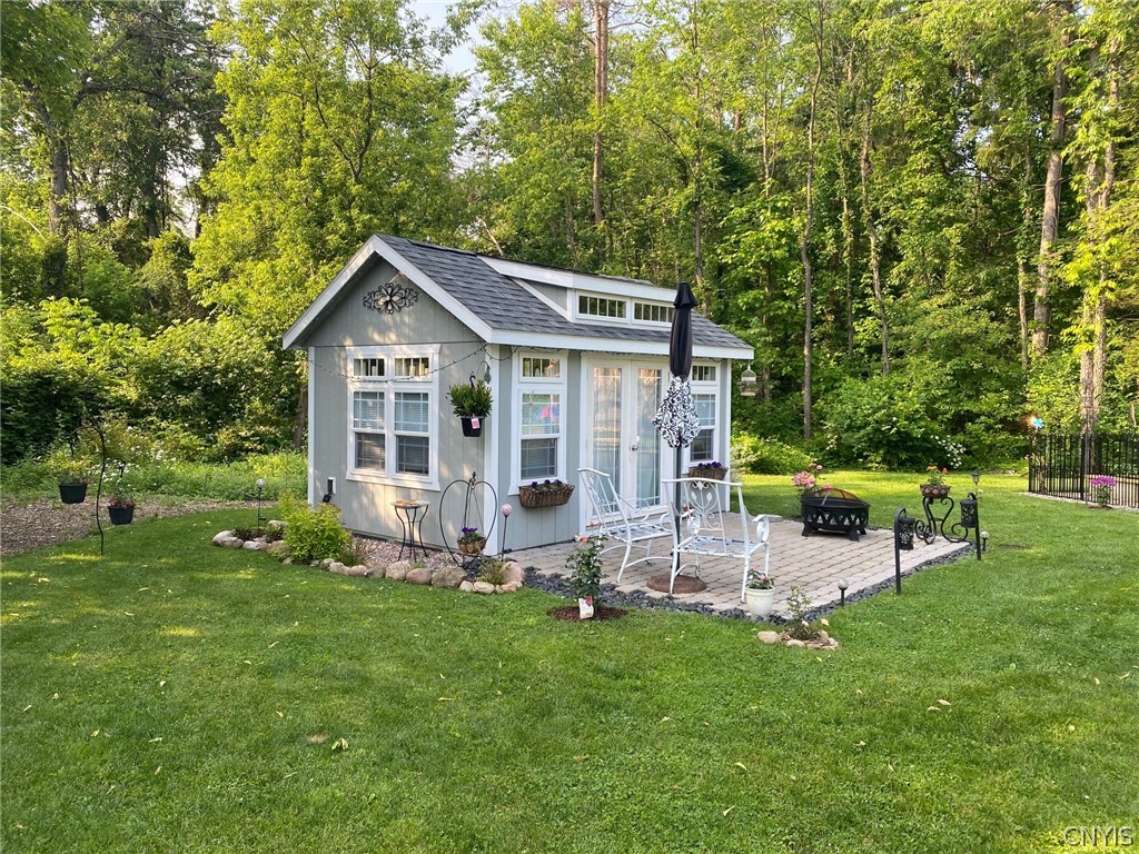 8245 Kirkville Road Manlius, NY 13082 - Photo 41 of 50 The sellers added side landscaping to the shed alo
