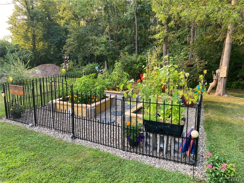 8245 Kirkville Road Manlius, NY 13082 - Photo 44 of 50 The fenced 18' x 18' raised garden bed was added i