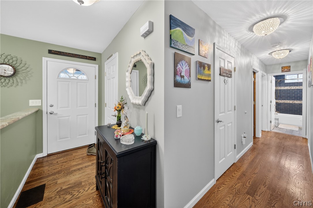 8245 Kirkville Road Manlius, NY 13082 - Photo 6 of 50 Greet your guests at the front door. The half wal