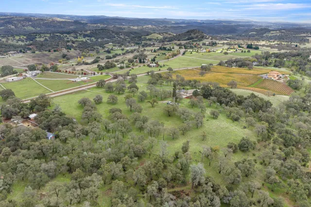 a view of a city with mountains in the background