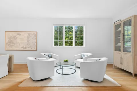 a living room with furniture and window